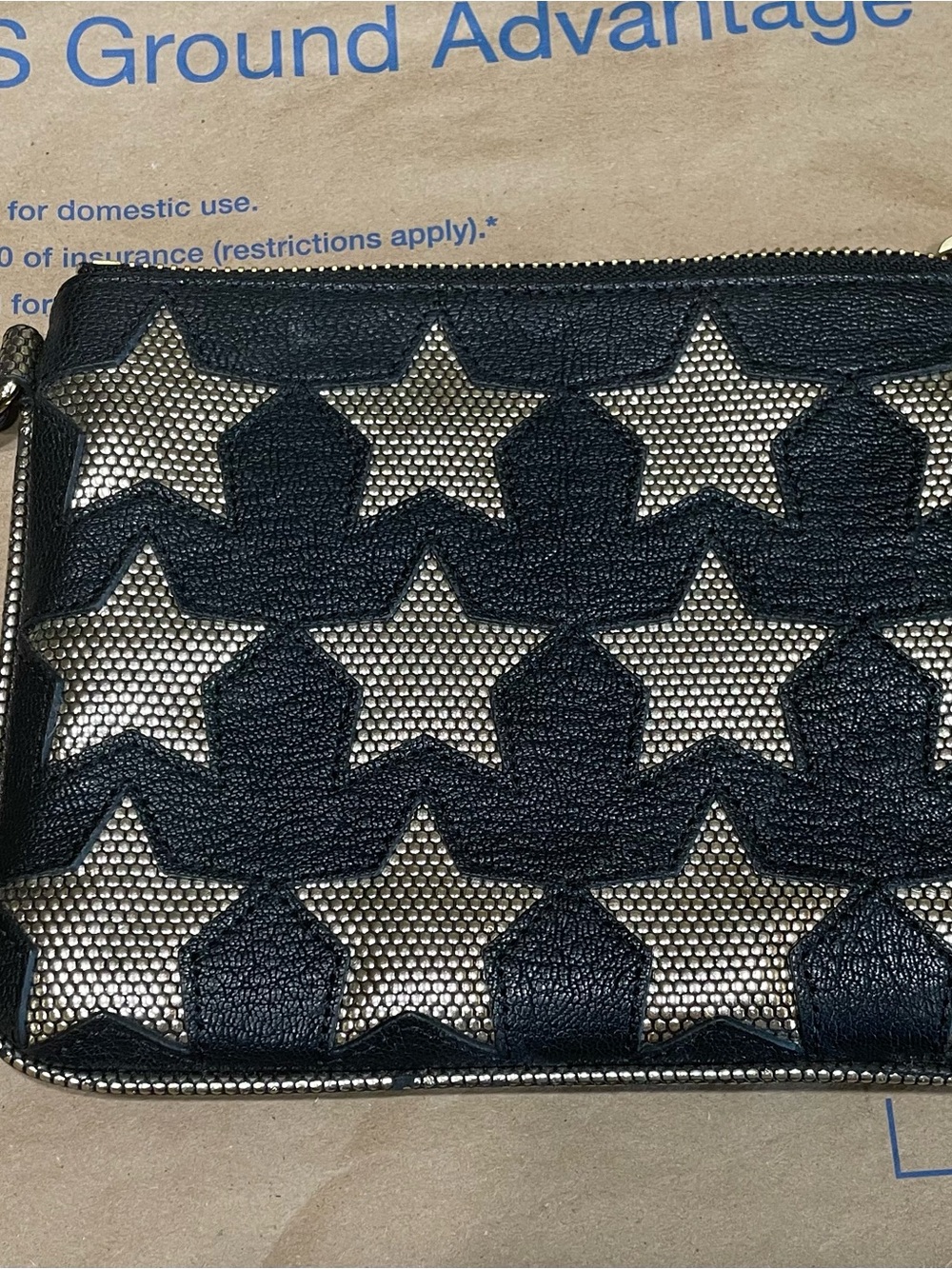 Juicy Couture Black 100% Goat Leather Wristlet with Metallic Stars EUC